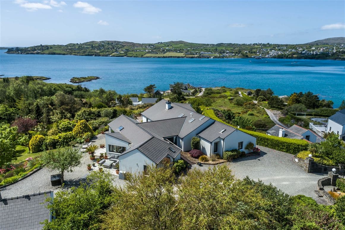 Aerial view of Sunset overlooking Schull Harbour with landscaped grounds