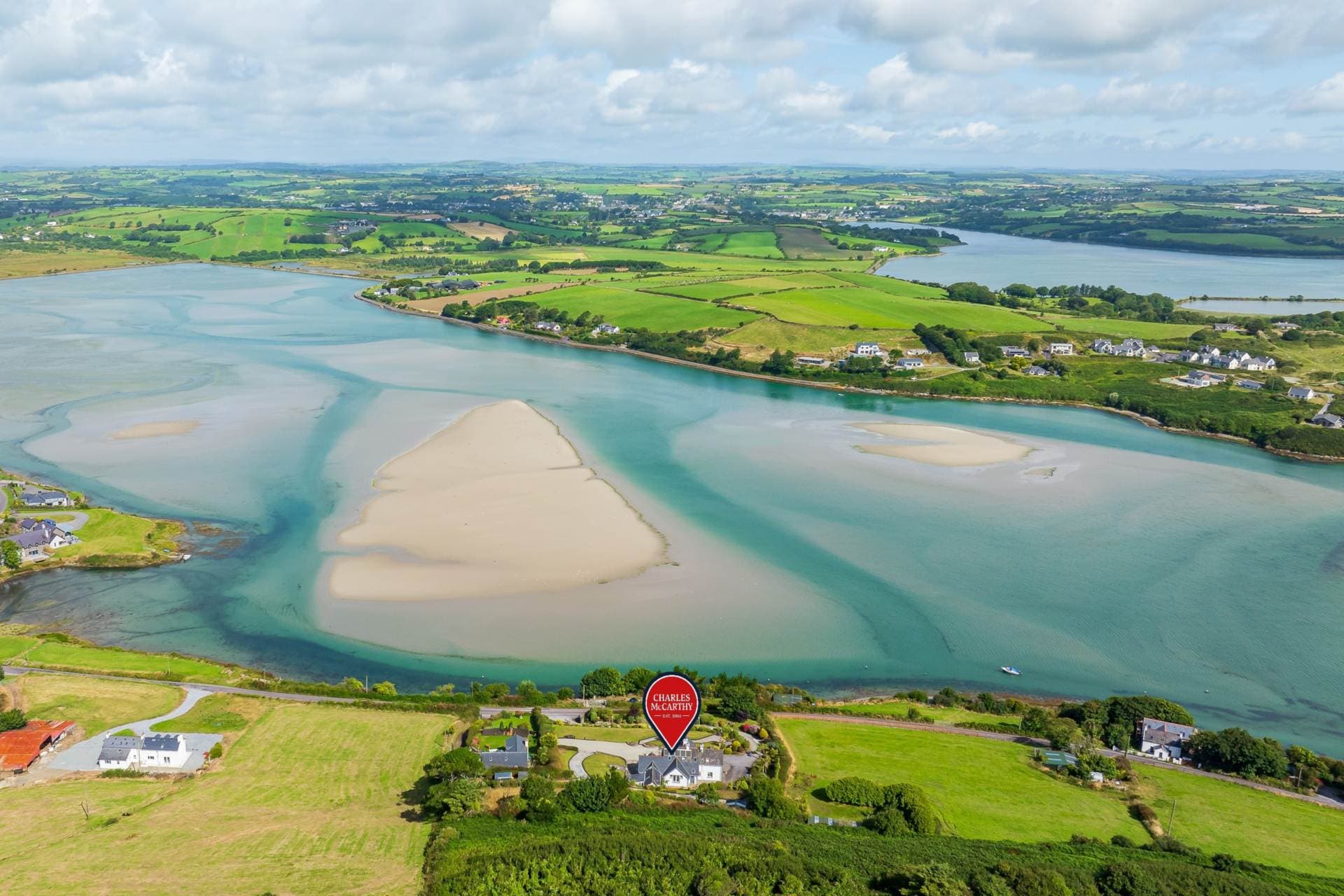 Aerial view of the property's coastal setting on the Dunmore Road
